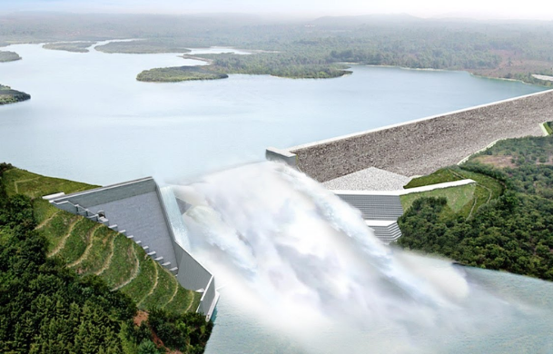 A large hydroelectric dam with massive water flow.