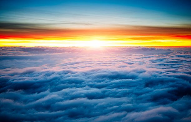 Sunrise Above The Clouds